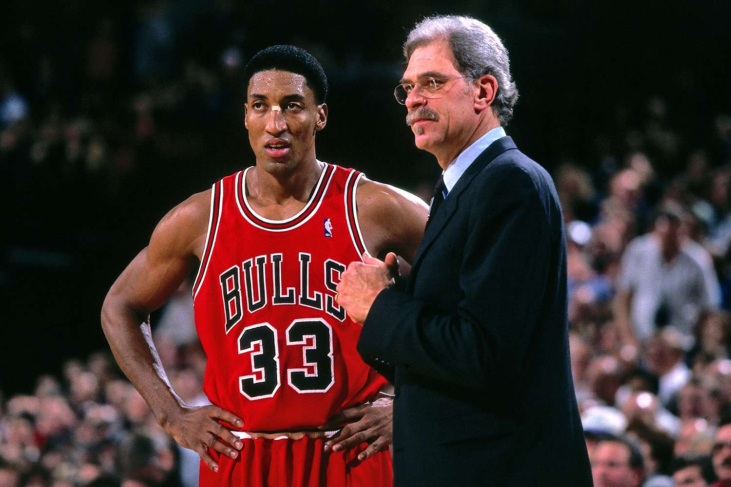 Scottie Pippen #33 and Head Coach Phil Jackson of the Chicago Bulls