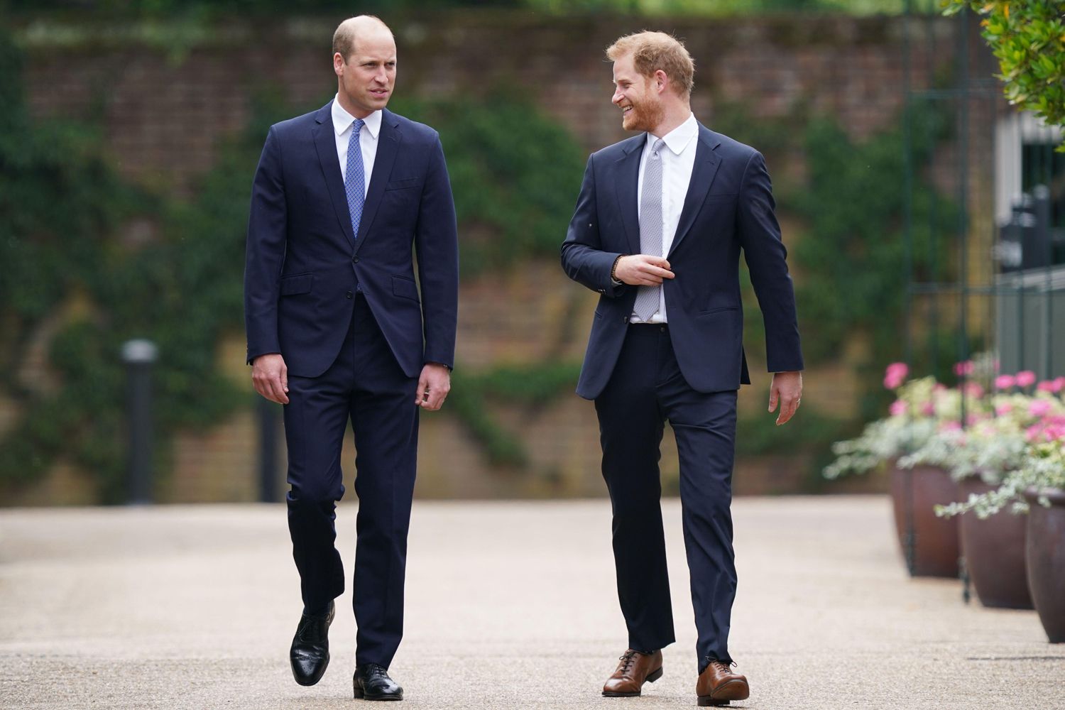 The Duke of Cambridge and Duke of Sussex arrive for the unveiling of a statue they commissioned of their mother Diana, Princess of Wales