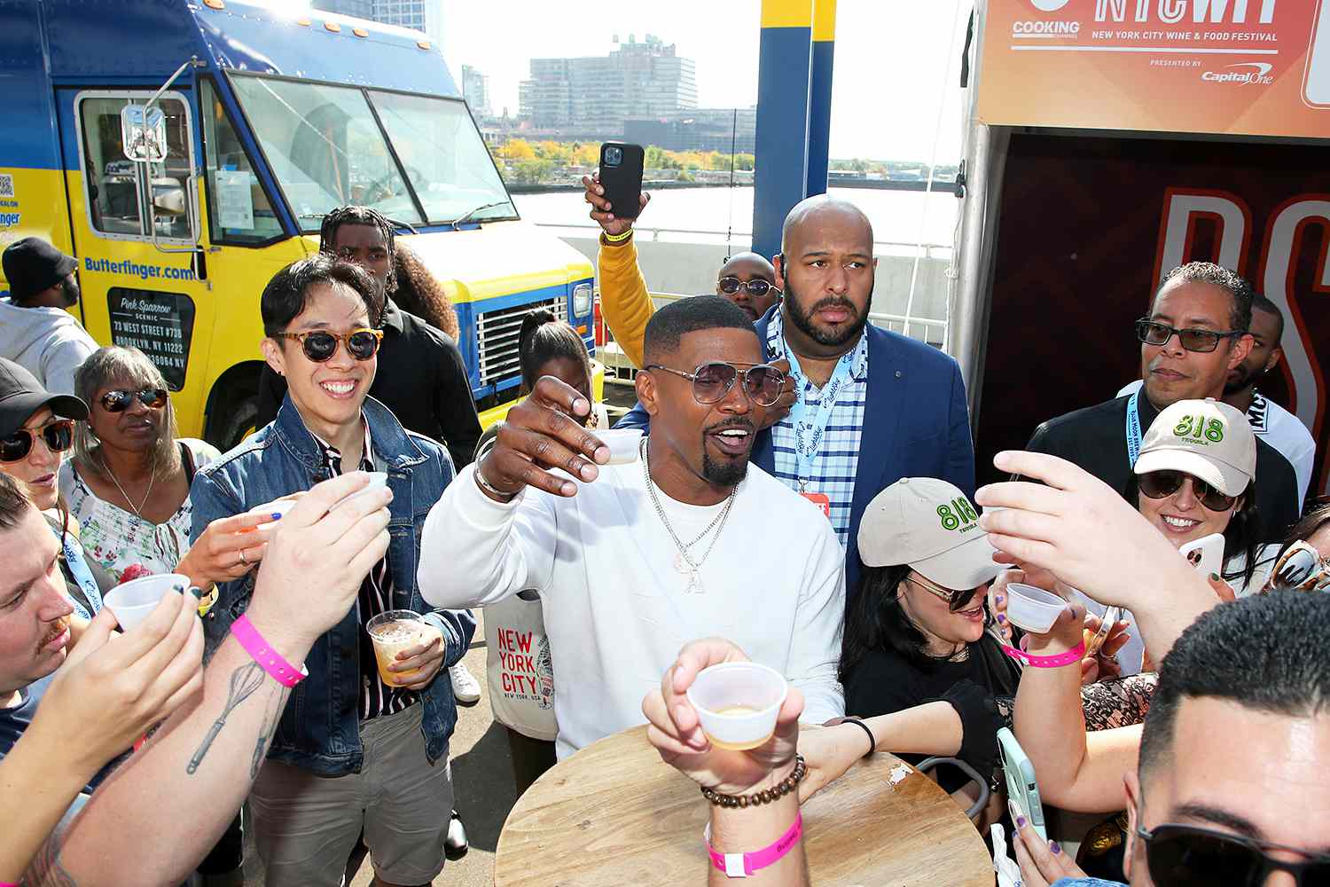 Jamie Foxx participates in a Brown Sugar Bourbon tasting during Southern Glazer's Wine & Spirits TRADE DAY at the Grand Tasting hosted by Wine Spectator during the Food Network & Cooking Channel New York City Wine & Food Festival presented by Capital One at Pier 76 on October 15, 2021 in New York City.