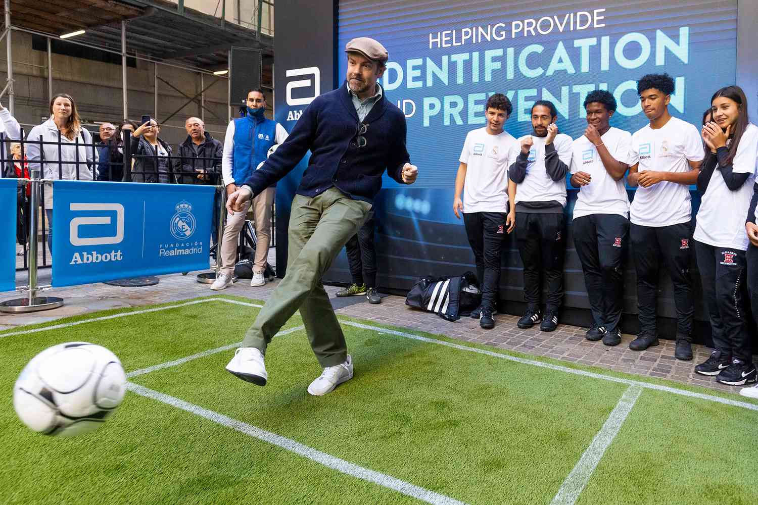 Actor Jason Sudeikis shows his soccer skills while running drills with teens from the Real Madrid Foundation's Social Sports School outside of the New York Stock Exchange (NYSE) following Abbott and Real Madrid's partnership announcement on Monday, Oct. 18, 2021, in New York