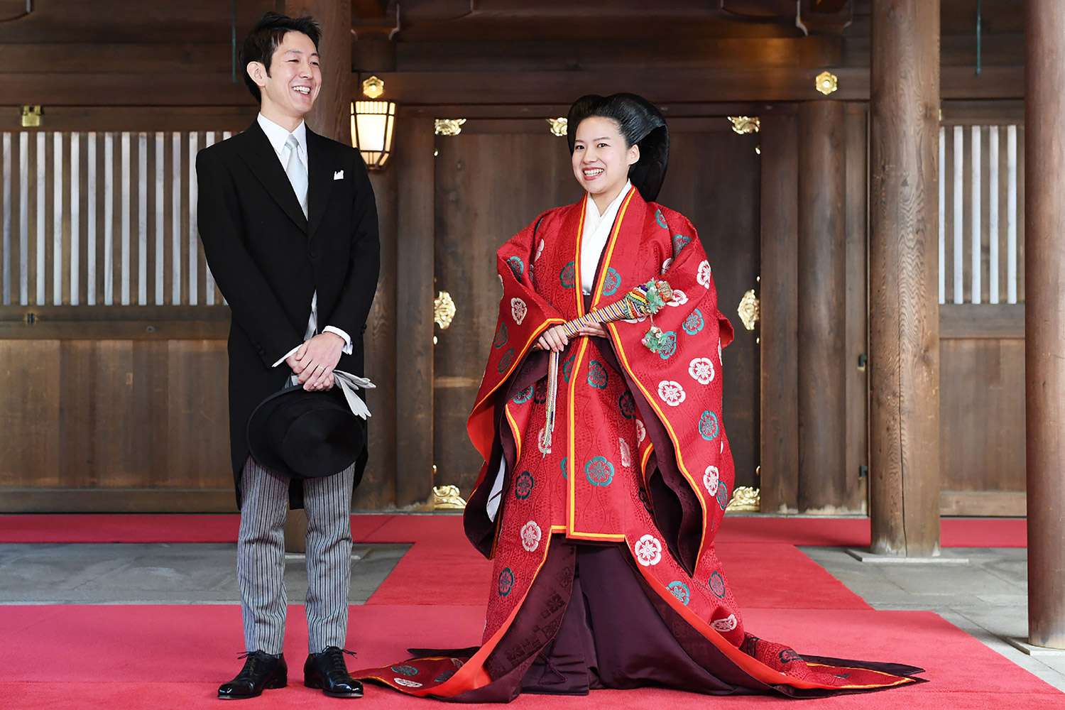 Princess Ayako (R) and her husband Kei Moriya