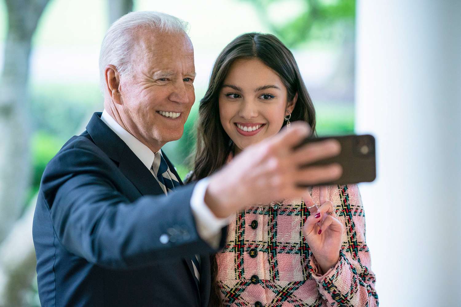 President Joe Biden records a video address with Olivia Rodrigo on Wednesday, July 14, 2021, in the Oval Office of the White House.
