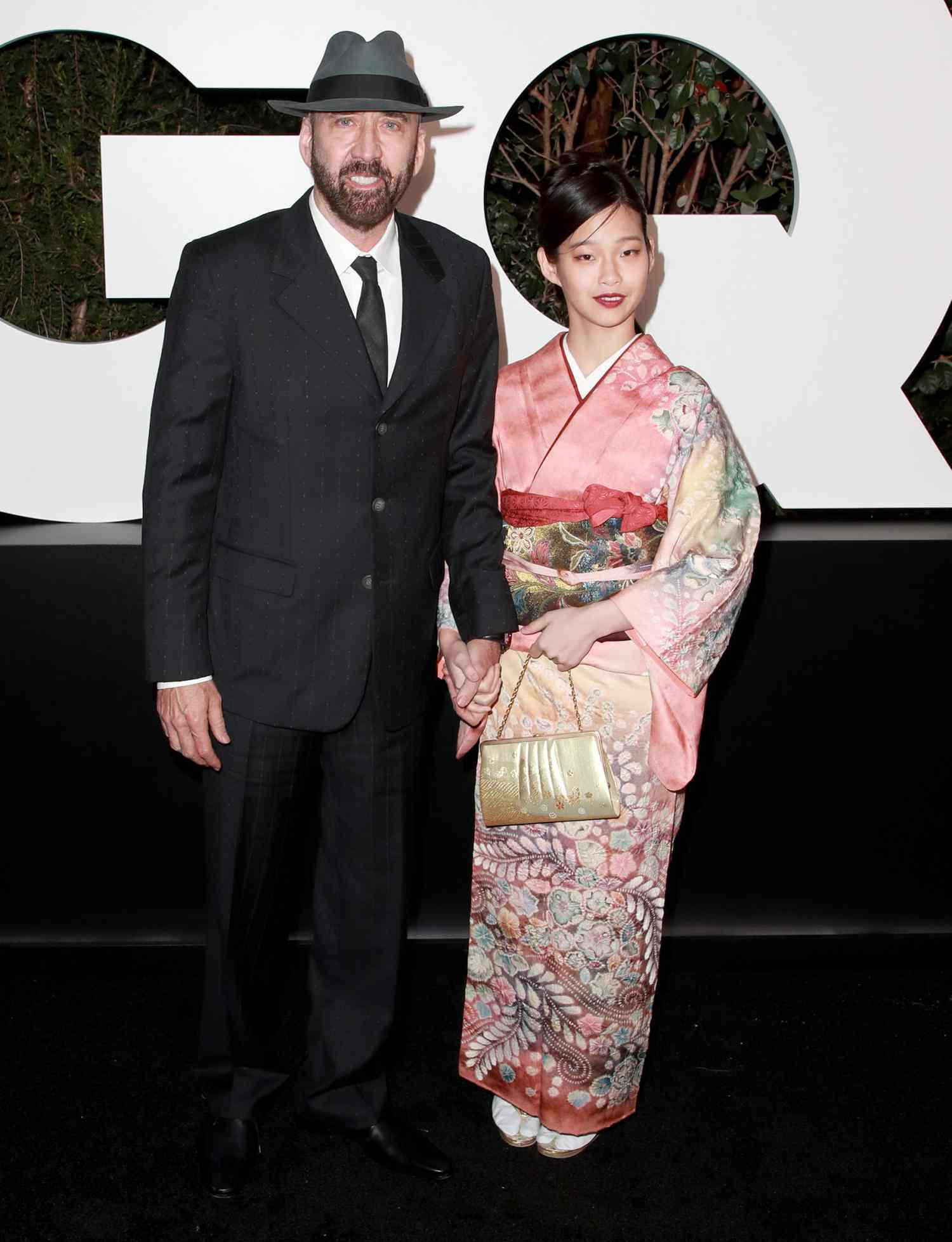 Nicholas Cage and Riko Shibata attend the 2021 GQ Men of the Year Party at the West Hollywood EDITION on November 18, 2021 in West Hollywood, California