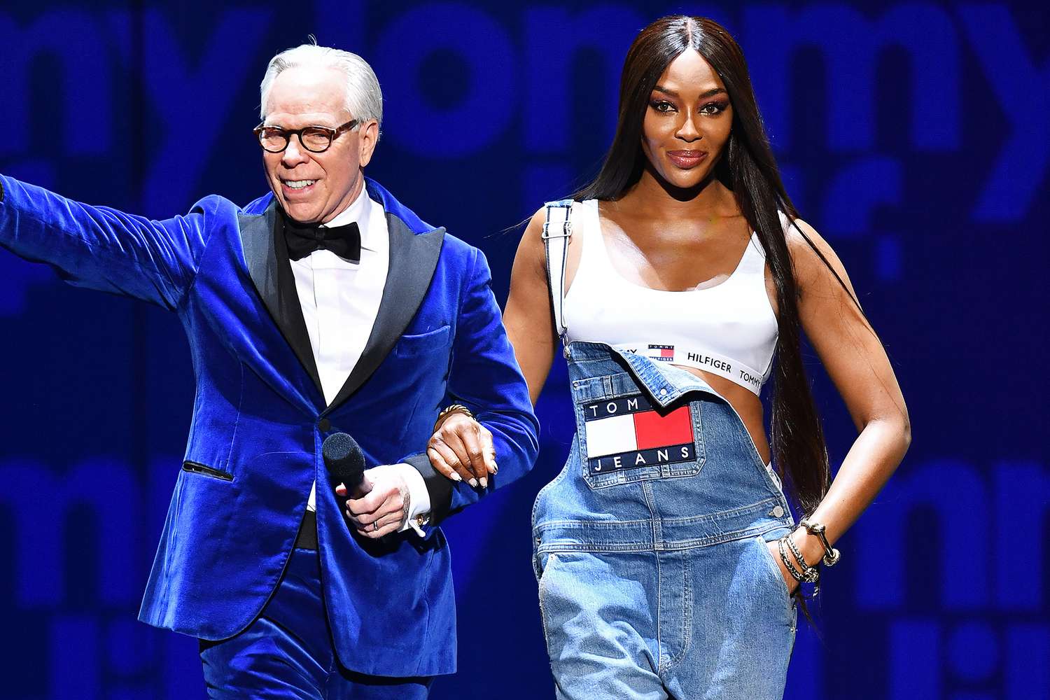 LONDON, ENGLAND - NOVEMBER 29: Tommy Hilfiger and Naomi Campbell on stage during The Fashion Awards 2021 at the Royal Albert Hall on November 29, 2021 in London, England. (Photo by Jeff Spicer/BFC/Getty Images for BFC)