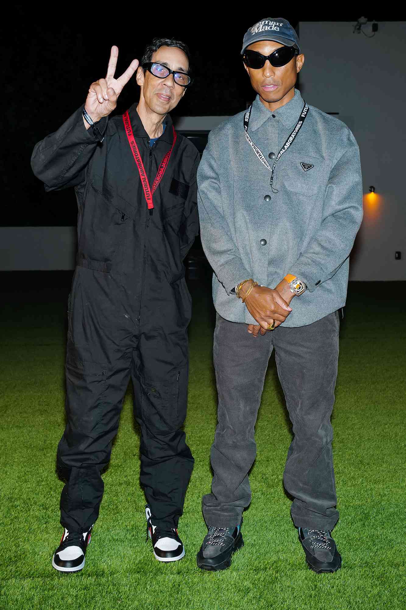 Futura and Pharrell Williams attend Futura Toasts to His Decades-Long Career with a Private Dinner Hosted by Eric Firestone Gallery, ICNCLST, and Diageo During Miami Art Week at Ocean Terrace at 1 Hotel South B on December 1, 2021