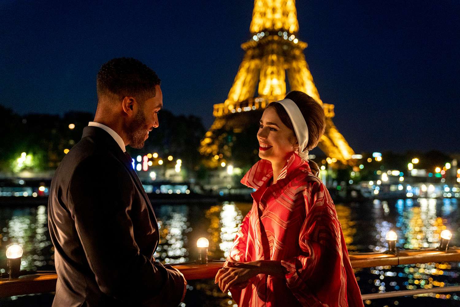 Emily in Paris. (L to R) Lucien Laviscount as Alfie, Lily Collins as Emily in episode 205 of Emily in Paris. Cr. Stéphanie Branchu/Netflix © 2021
