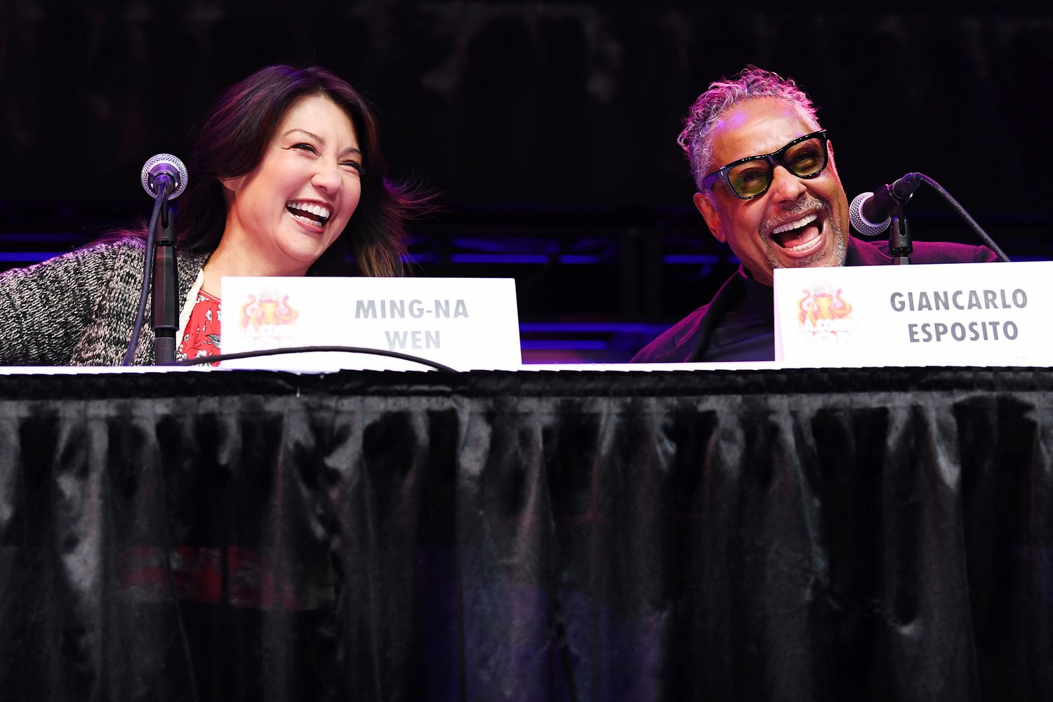 LOS ANGELES, CALIFORNIA - DECEMBER 05: Actors Ming-Na Wen (L) and Giancarlo Esposito speak onstage during 2021 Los Angeles Comic Con at Los Angeles Convention Center on December 05, 2021 in Los Angeles, California. (Photo by Chelsea Guglielmino/Getty Images)