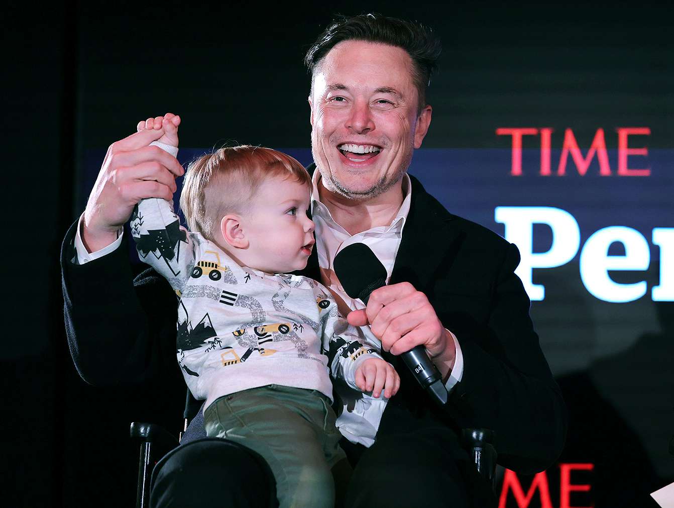 NEW YORK, NEW YORK - DECEMBER 13: Elon Musk and son X Æ A-12 on stage TIME Person of the Year on December 13, 2021 in New York City.