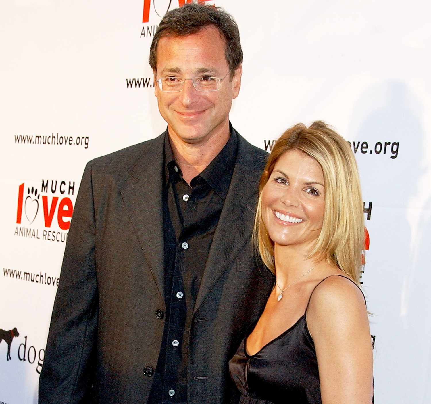 Bob Saget and actress Lori Loughlin arrive at the "Much Love Animal Rescue Benefit" at the Playboy Mansion on July 14, 2007 in Los Angeles, California.