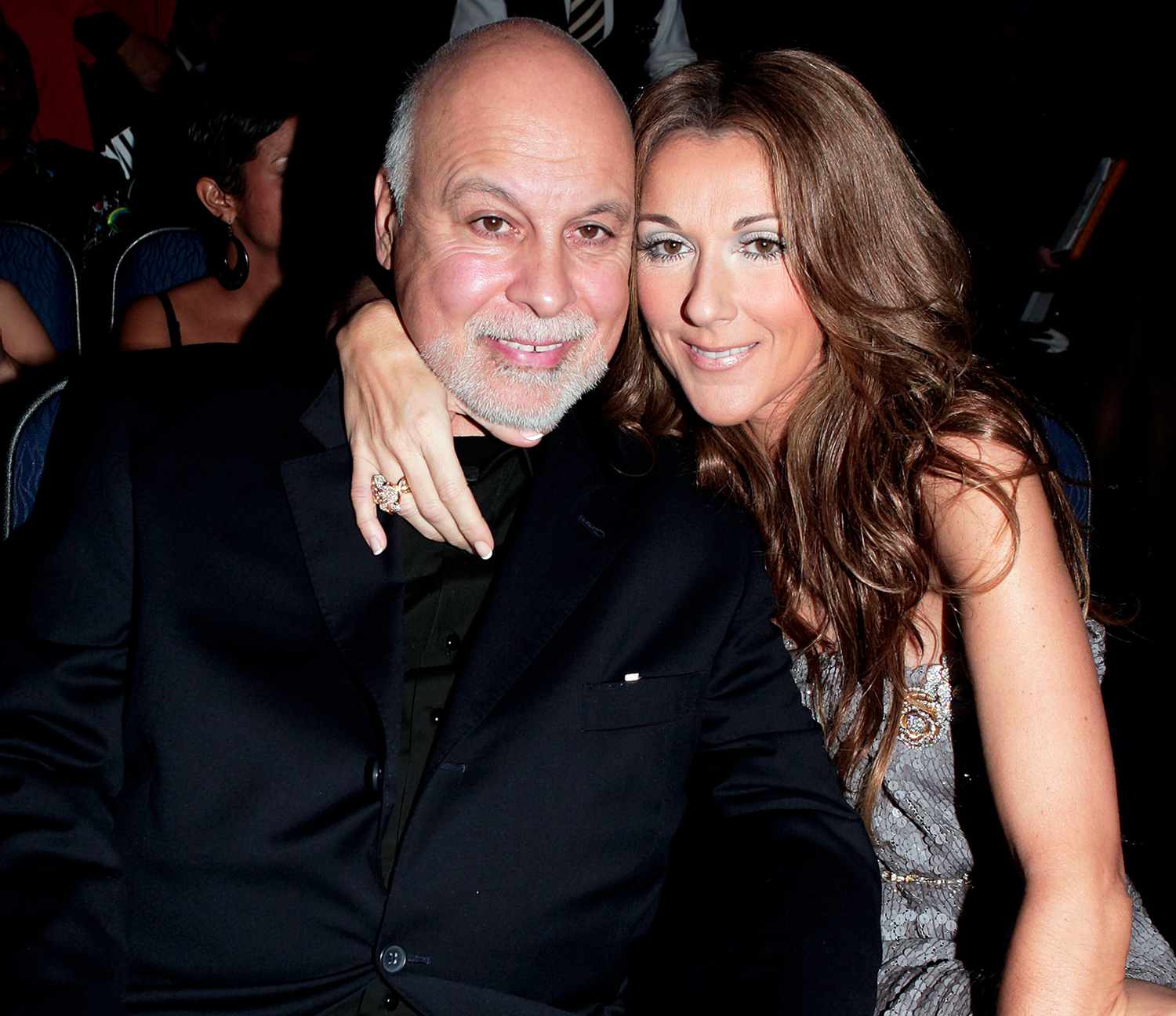 Singer Celine Dion (R) and husband Rene Angelil in the audience during the 2007 American Music Awards held at the Nokia Theatre L.A. LIVE on November 18, 2007 in Los Angeles, California.