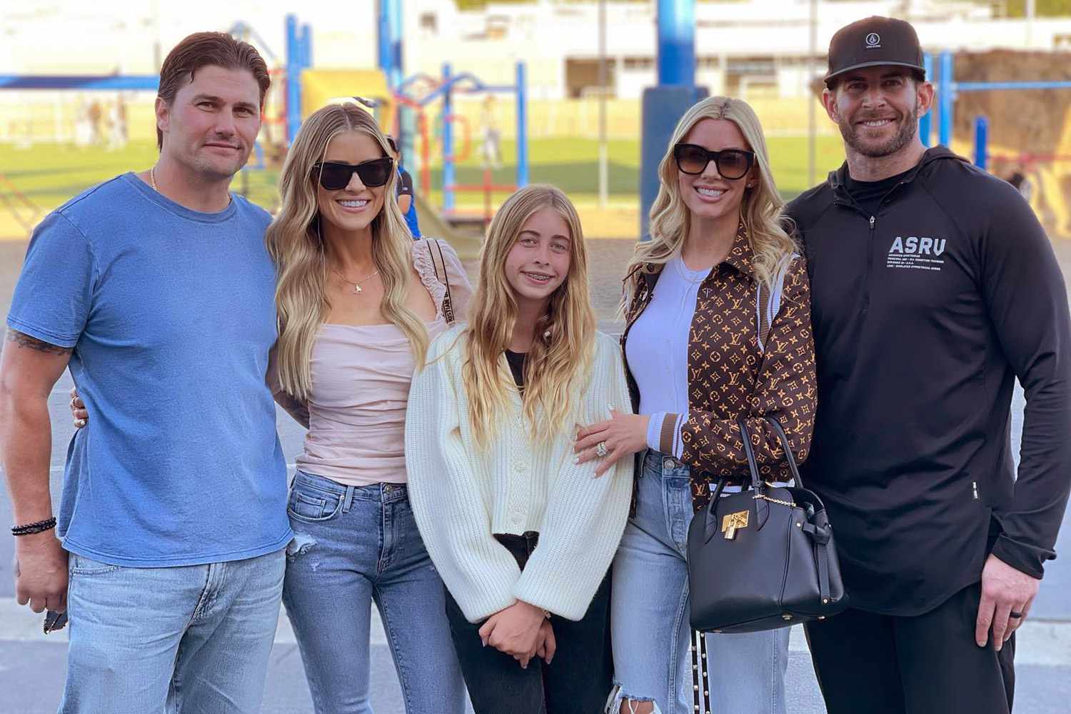 https://www.instagram.com/p/CdevCzurO1u/ hed: Tarek El Mousa and Christina Hall Put on a United Front in a Family Photo Featuring New Spouses After Public Spat