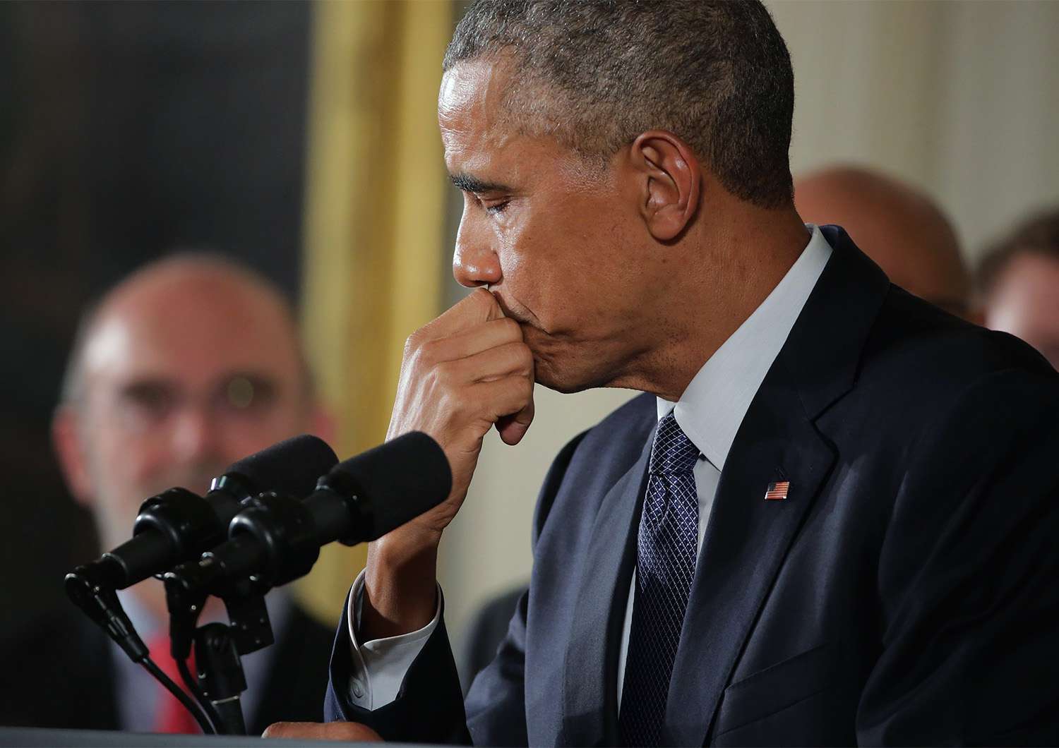 WASHINGTON, DC - JANUARY 05: U.S. President Barack Obama pauses as he talks about the victims of the 2012 Sandy Hook Elementary School shooting and about his efforts to increase federal gun control in the East Room of the White House January 5, 2016 in Washington, DC. Without approval from Congress, Obama is sidestepping the legislative process with executive actions to expand background checks for some firearm purchases and step up federal enforcement of existing gun laws. (Photo by Chip Somodevilla/Getty Images)