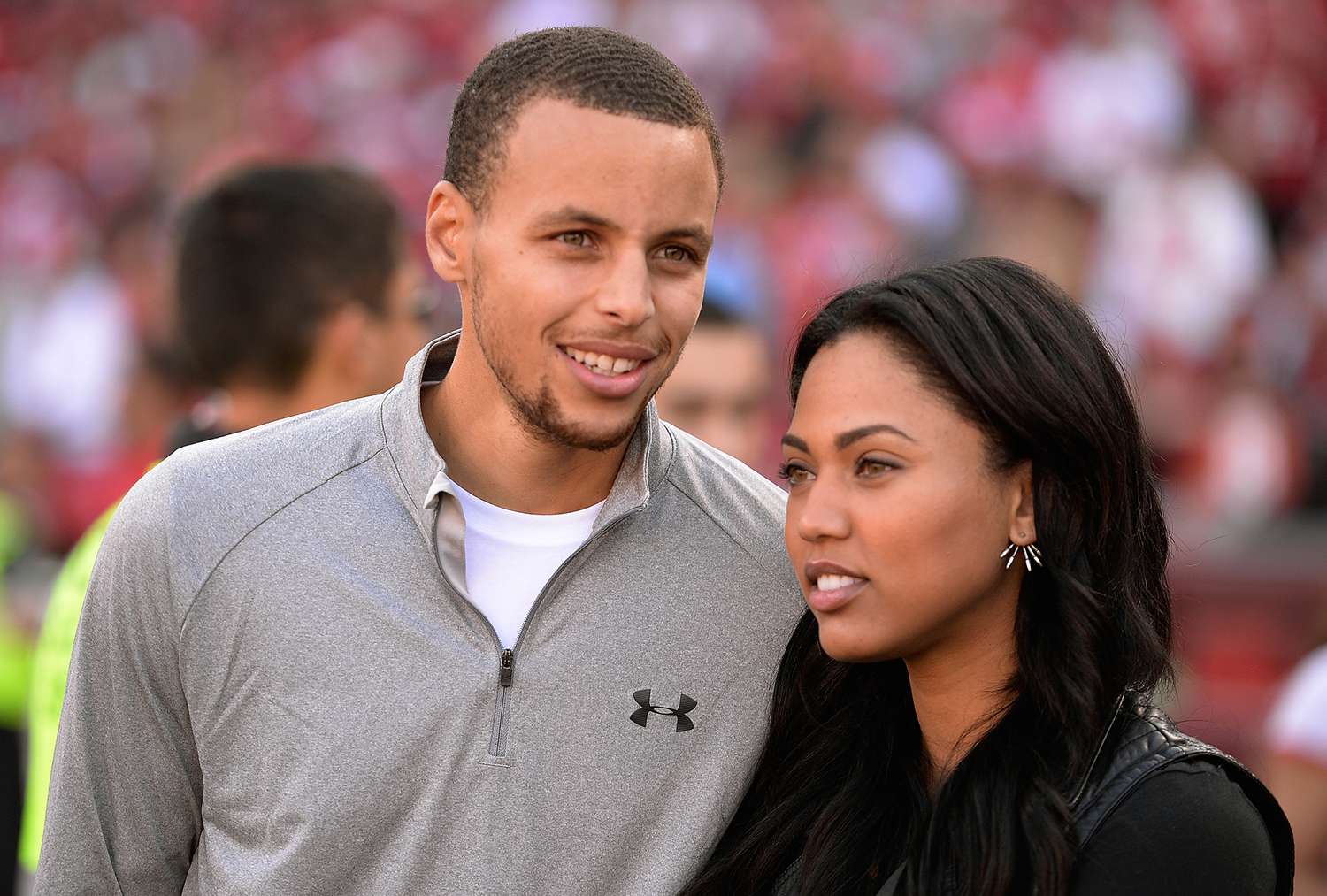 Stephen Curry and his wife Ayesha are fans on the sidelines during the Carolina Panthers and San Francisco 49ers NFL Game at Candlestick Park on November 10, 2013 in San Francisco, California. The Panthers won the game 10-9