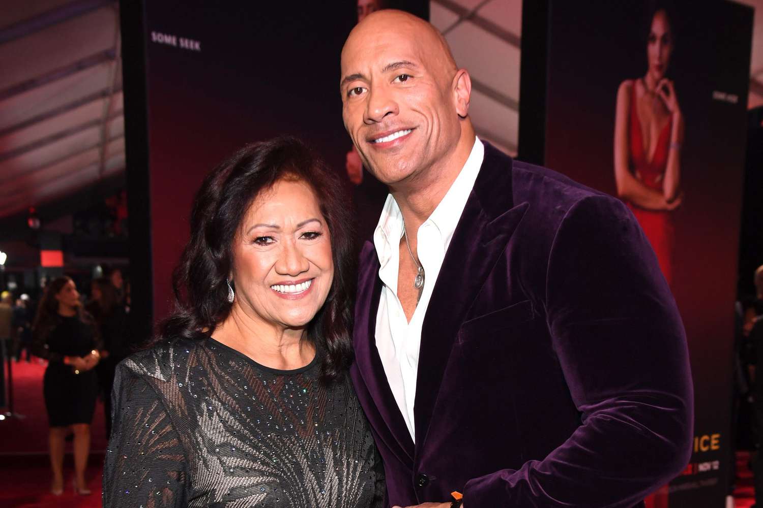 LOS ANGELES, CALIFORNIA - NOVEMBER 03: (L-R) Ata Johnson and Dwayne Johnson attend the World Premiere of Netflix's "Red Notice" at Regal LA Live on November 03, 2021 in Los Angeles, California. (Photo by Kevin Mazur/Getty Images for Netflix)