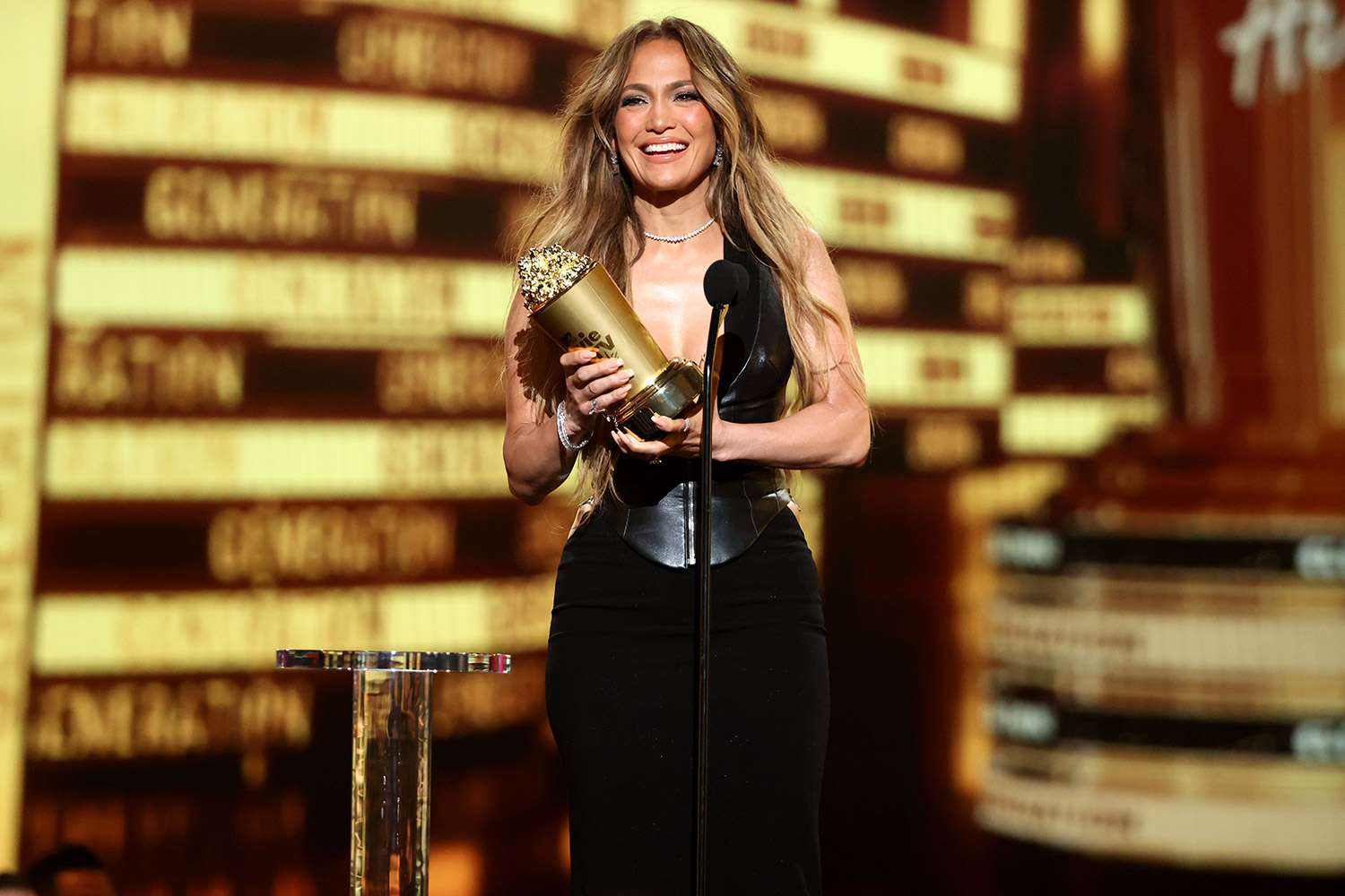SANTA MONICA, CALIFORNIA - JUNE 05: Honoree Jennifer Lopez accepts the MTV Generation Award onstage during the 2022 MTV Movie & TV Awards at Barker Hangar on June 05, 2022 in Santa Monica, California. (Photo by Rich Polk/Getty Images for MTV)