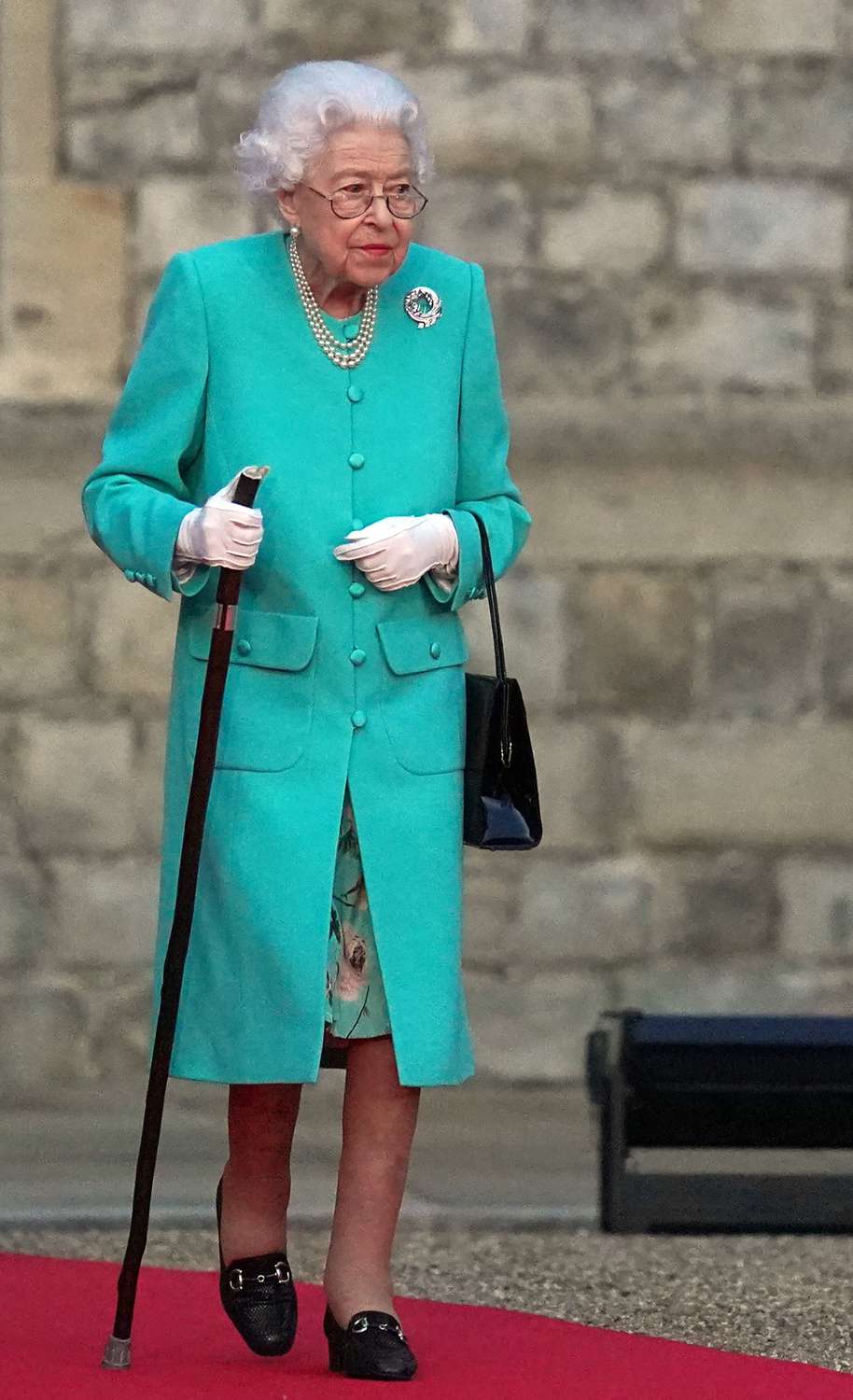 Britain's Queen Elizabeth II arrives to attend a ceremony to start the lighting of the Principal Beacon outside of Buckingham Palace in London, from the Quadrangle at Windsor Castle in Windsor, west of London, on June 2, 2022, as part of Platinum Jubilee celebrations. - The queen will be seen again at Windsor Castle, west of London, as more than 2,800 beacons are lit at Buckingham Palace and across the UK, including atop the four highest peaks, as well as on the Channel Islands, the Isle of Man, and British Overseas Territories. Flaming tributes will be seen in 54 Commonwealth capitals across five continents, from Tonga and Samoa in the South Pacific to Belize in the Caribbean.