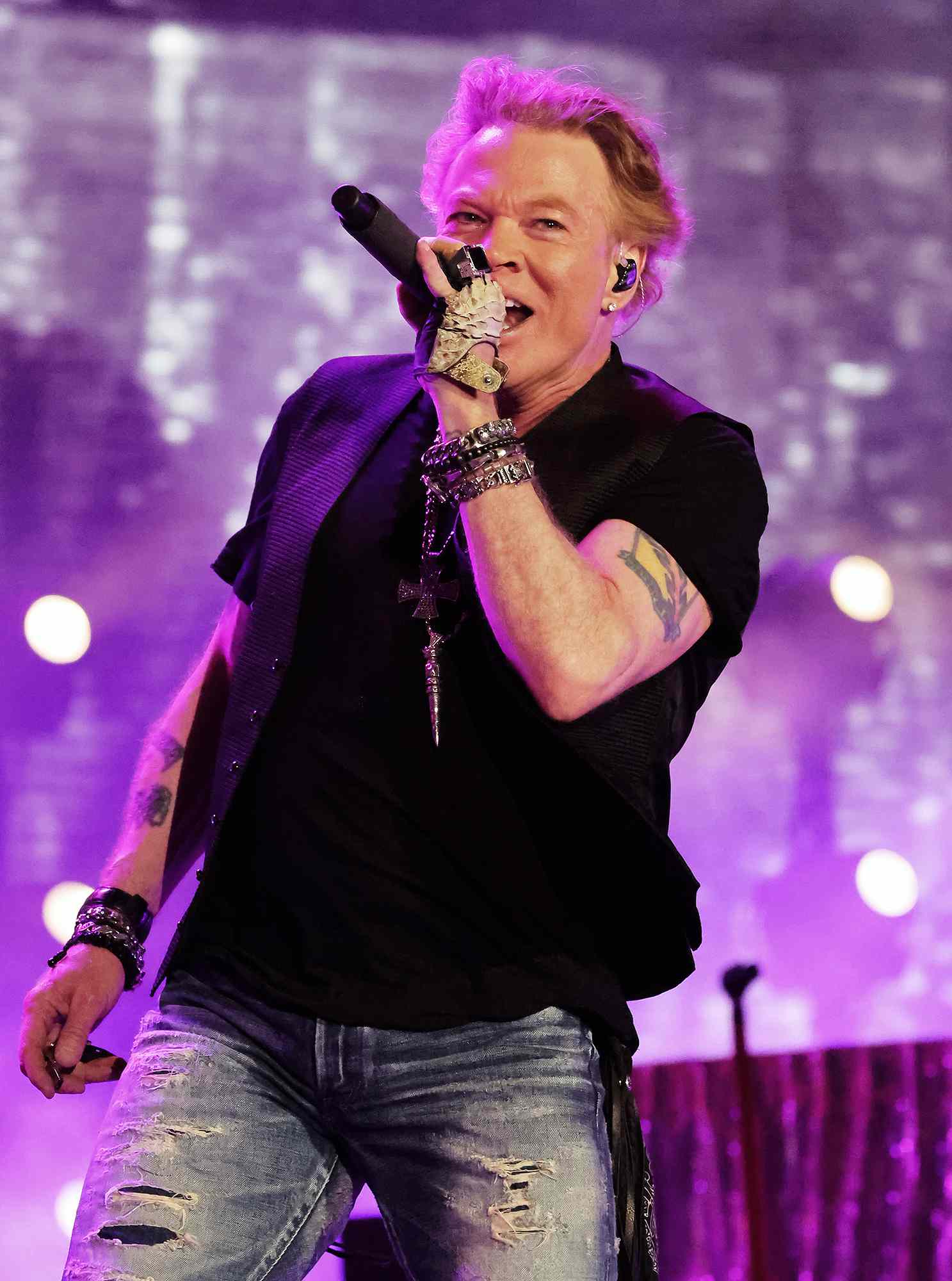 Axl Rose 'Sorting Out' Issues After Illness Cancels Guns N' Roses Show | PEOPLE.com