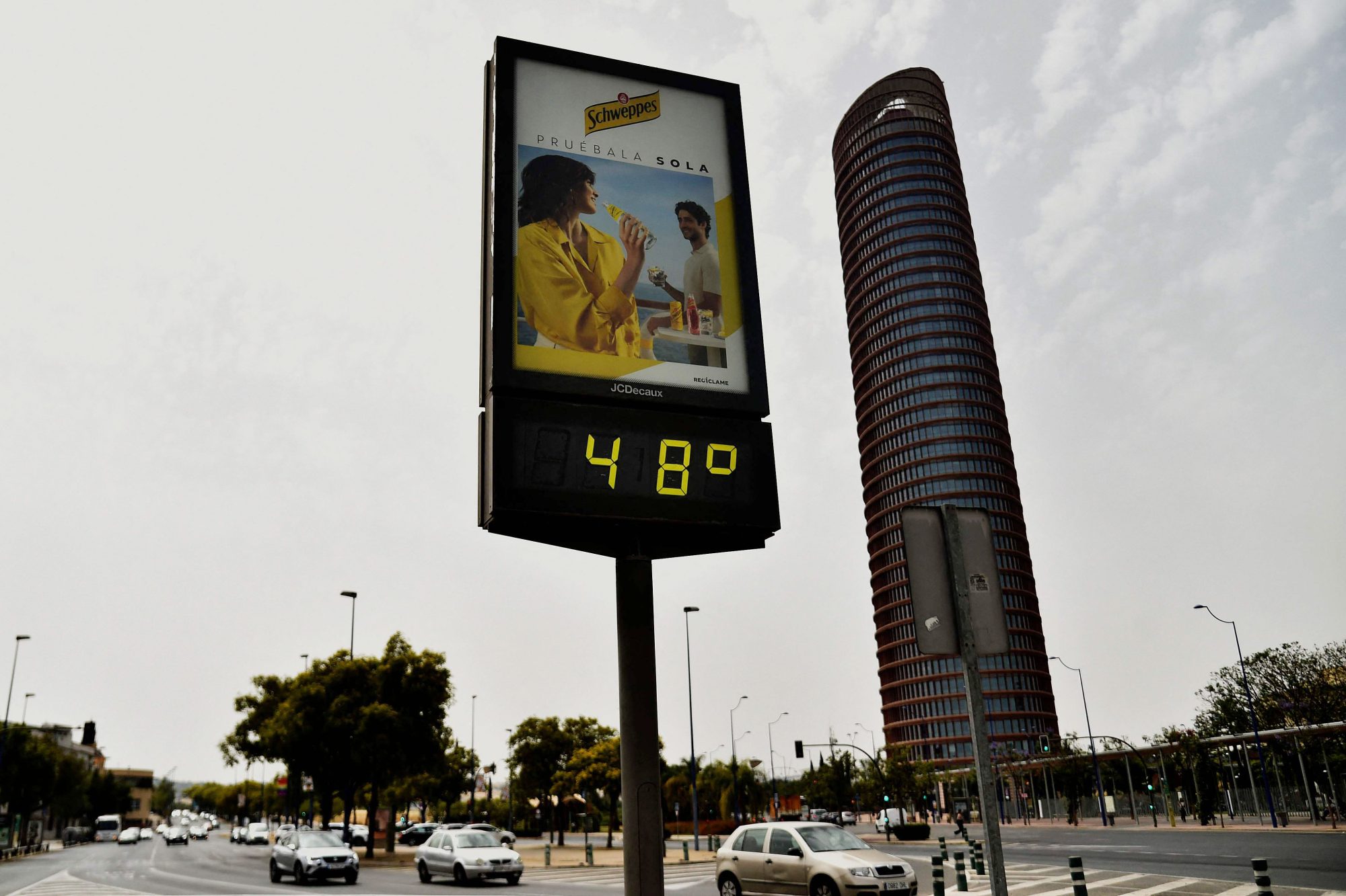 (FILES) In this file photo taken on June 13, 2022 a street thermometer reads 48 degrees Celsius during a heatwave in Seville. - In the midst of Europe's heatwaves, social networks have seen a surge in posts showing previous temperature extremes in an attempt to deny global warming, but this data does not contradict the phenomenon, experts say. (Photo by CRISTINA QUICLER / AFP) (Photo by CRISTINA QUICLER/AFP via Getty Images)