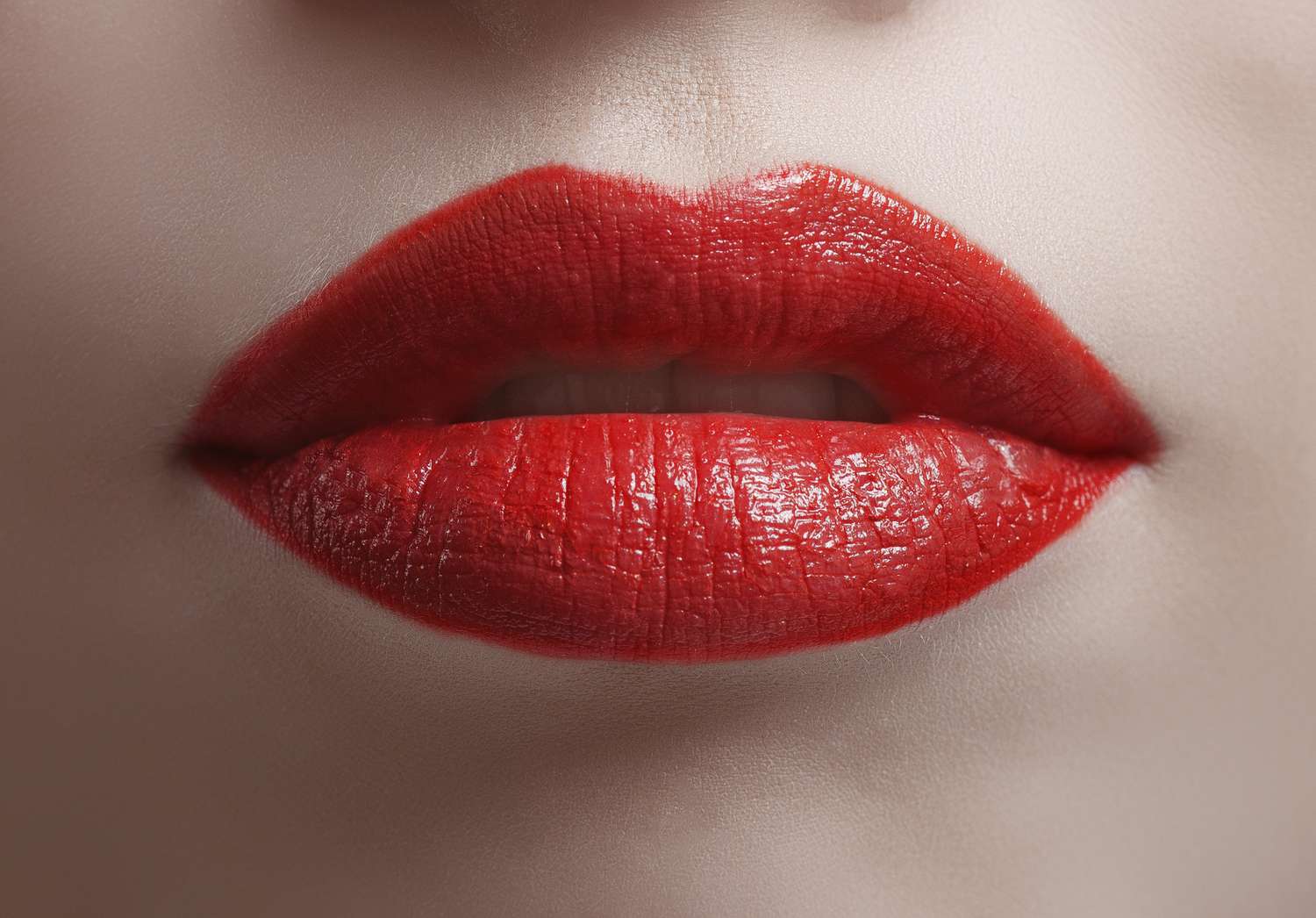 Close up of bright red shiny lips