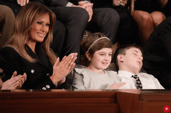 Joshau Trump (right), a Delaware sixth-grader, sleeps during President Donald Trump's State of the Union address on Tuesday nightAlex Wong/Getty