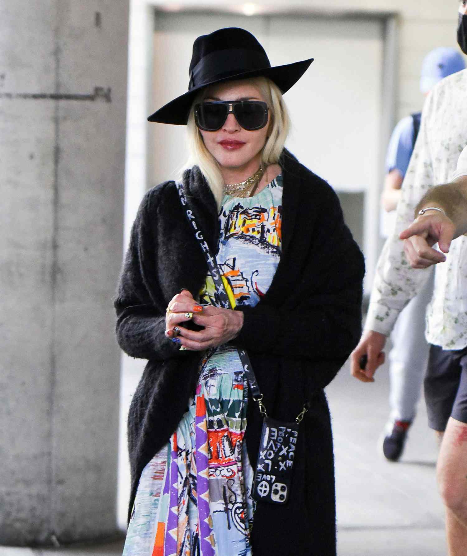 Madonna Looks Fashionable as She Arrives at JFK Airport