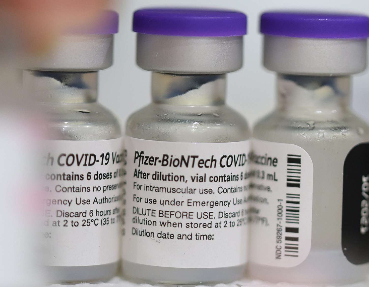 Vials of the Pfizer COVID-19 vaccine are seen at a