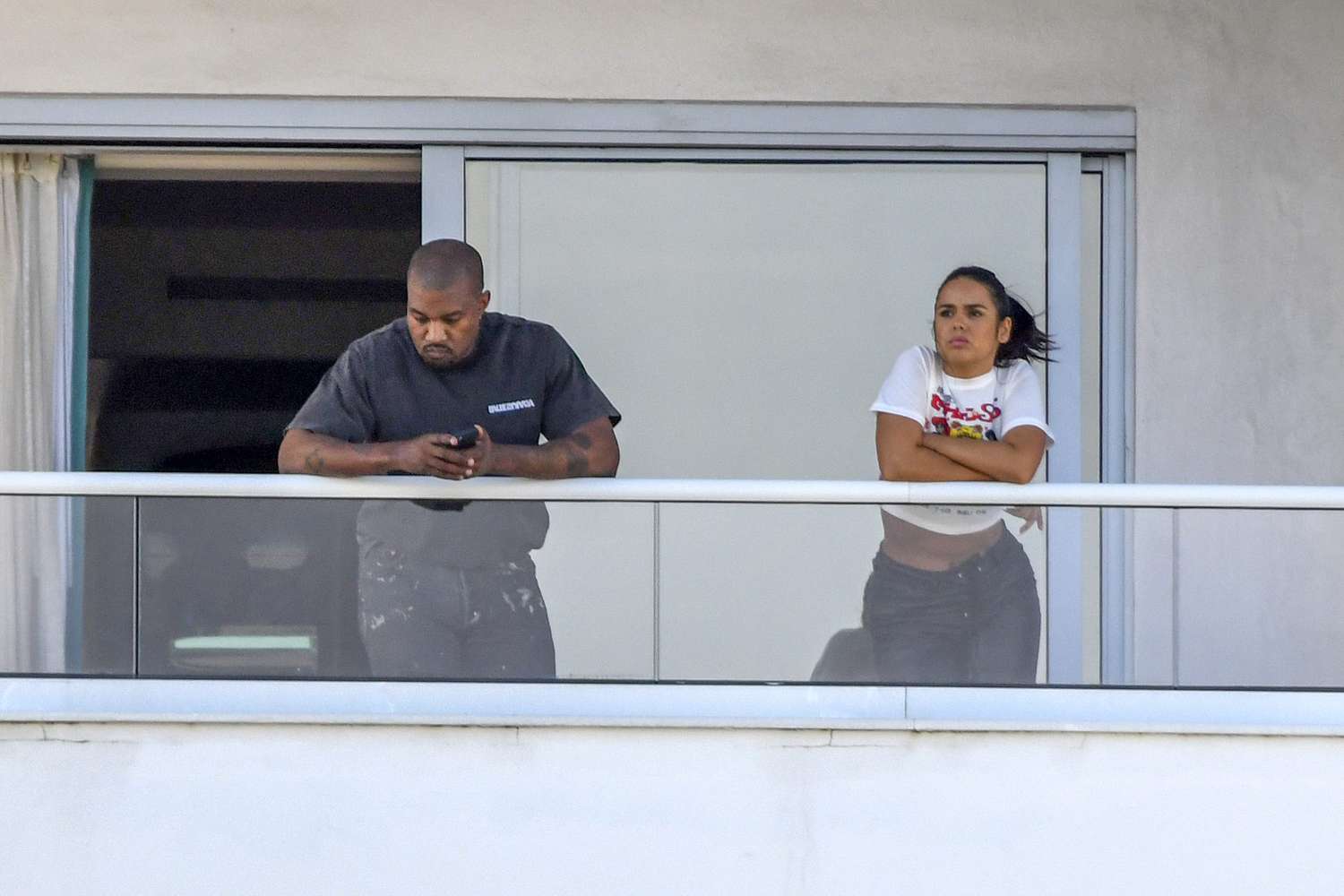 Mysterious Girl Emerges from Kanye West’s Hotel Room as He Enjoys New Year’s Break in Miami