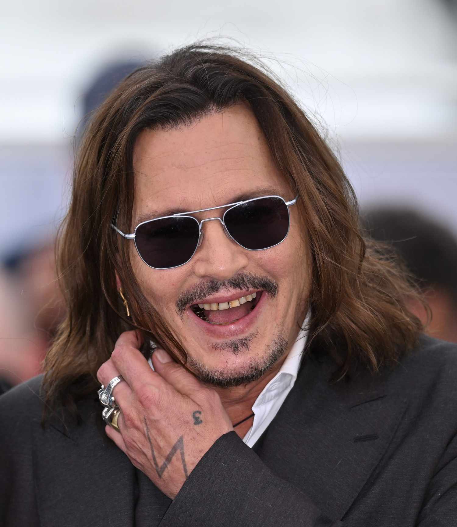 Depp dientes Jeanne du Barry photocall at the 2023 Cannes Film Festival