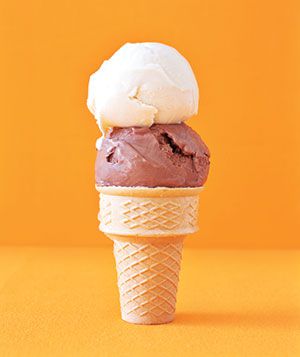 Vanilla and chocolate ice cream in a cone