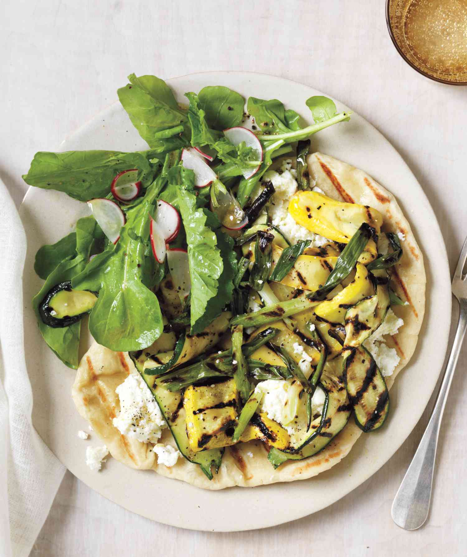 Grilled Pizzas With Ricotta, Summer Squash, and Scallions