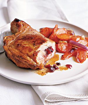 Cranberry-Stuffed Pork Chops With Roasted Carrots