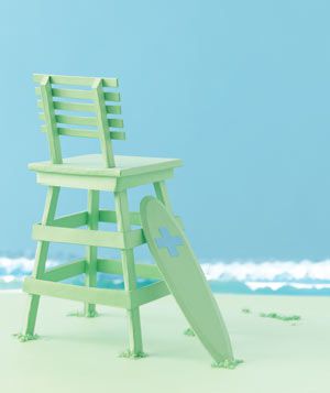 Paper construction of a lifeguard chair and rescue board by Matthew Sporzynski