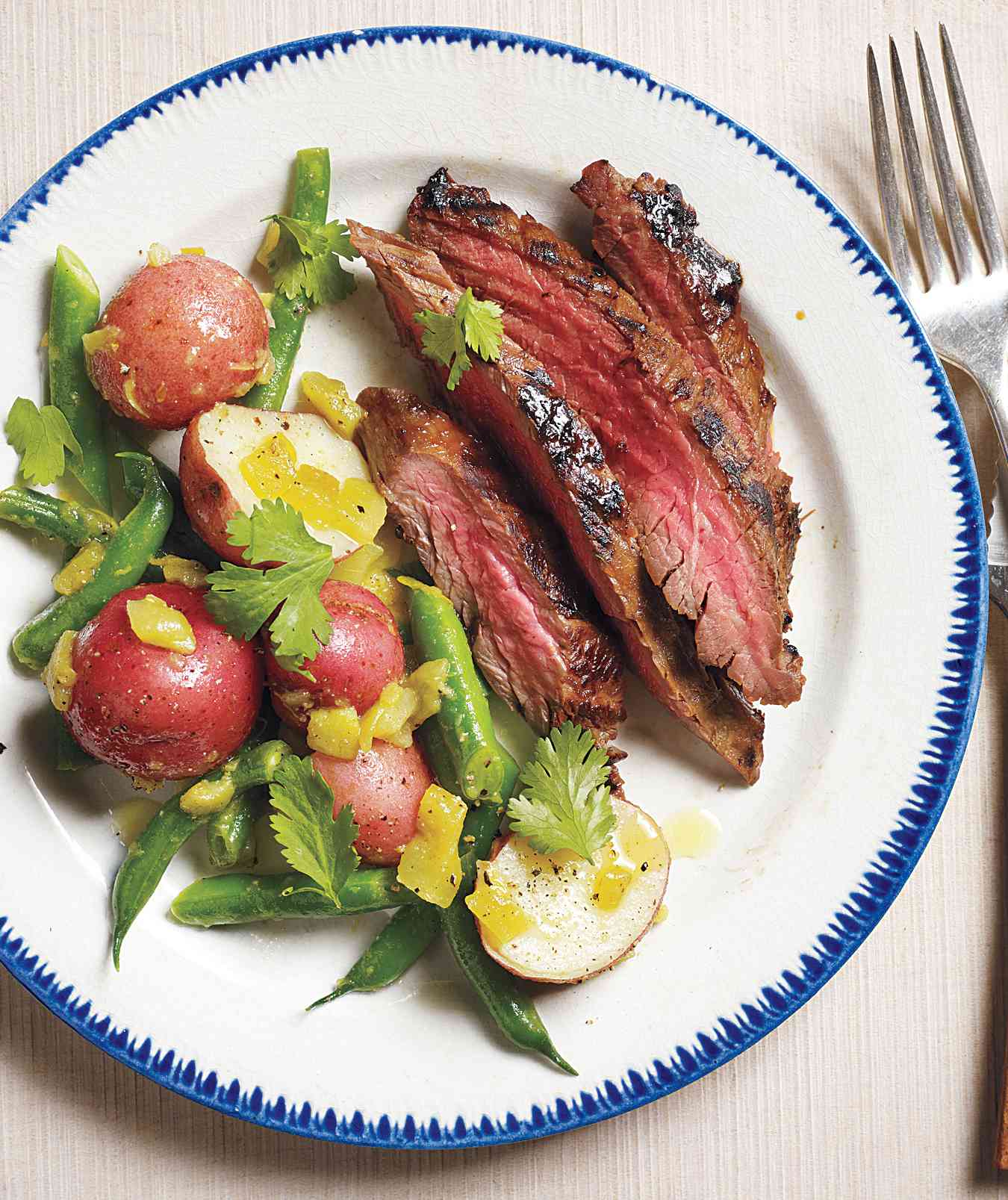 Pineapple-Marinated Steak With Spicy Potatoes and Green Beans 