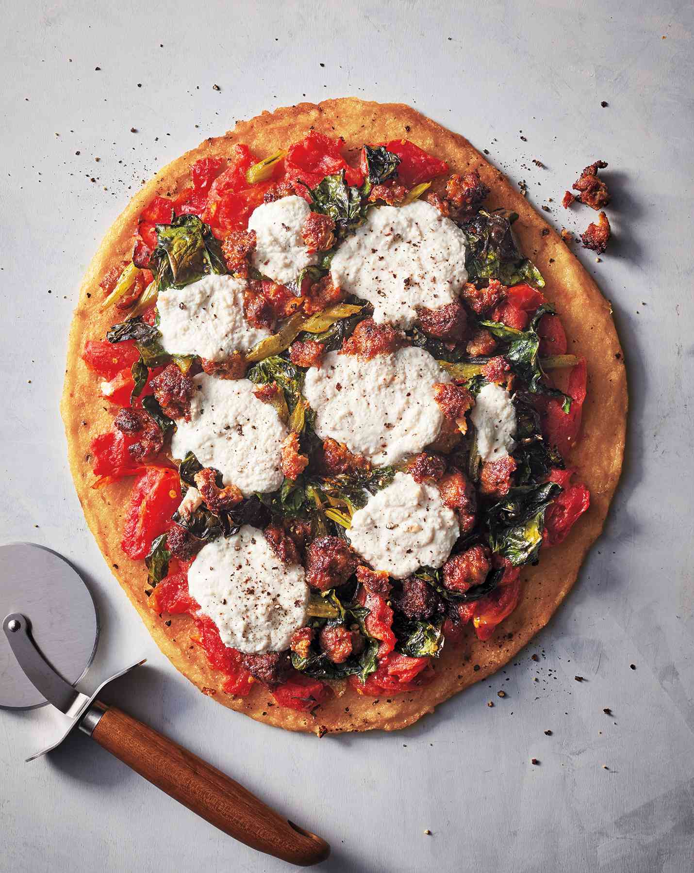 Polenta Pizza With Sausage, Swiss Chard, and Ricotta