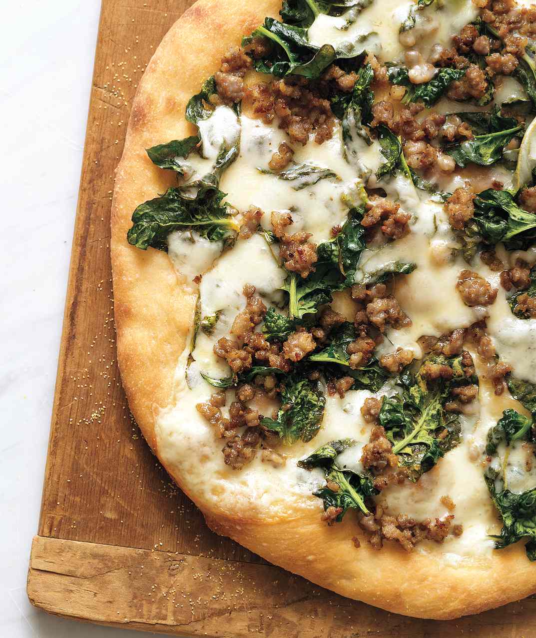 Sausage, Spinach, and Provolone Pizza