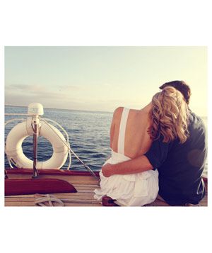 Engaged couple on boat