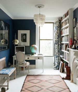 Navy blue walls in a home office