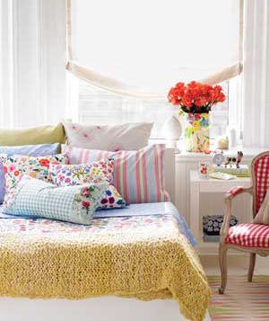Bed covered with pillows