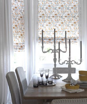 White room with patterned curtains