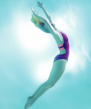 Model in one-piece swimsuit