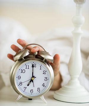 Alarm clock with hand