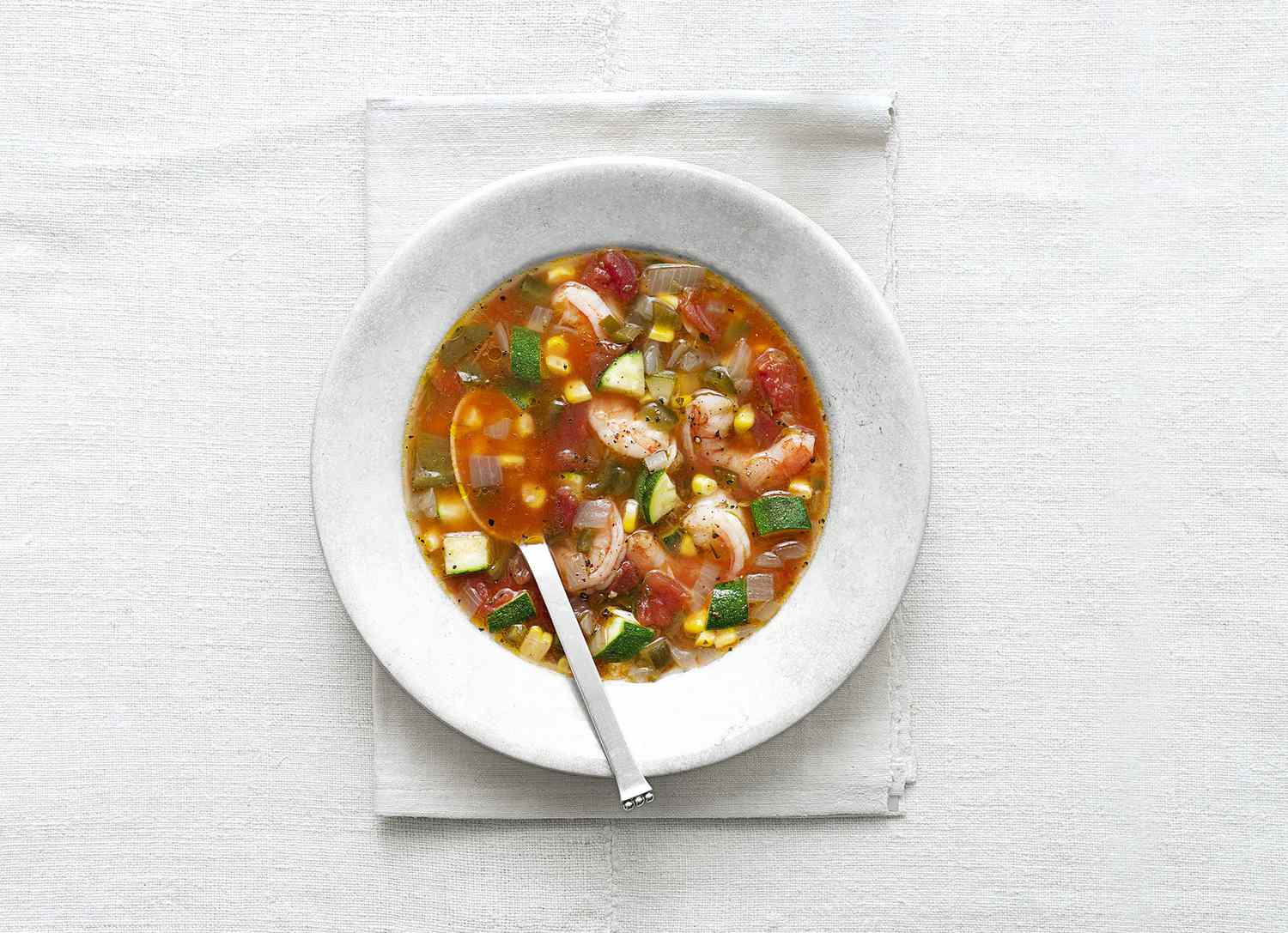 Summer Tomato Soup With Shrimp, Zucchini, and Corn 