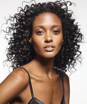 Model with black curly hair