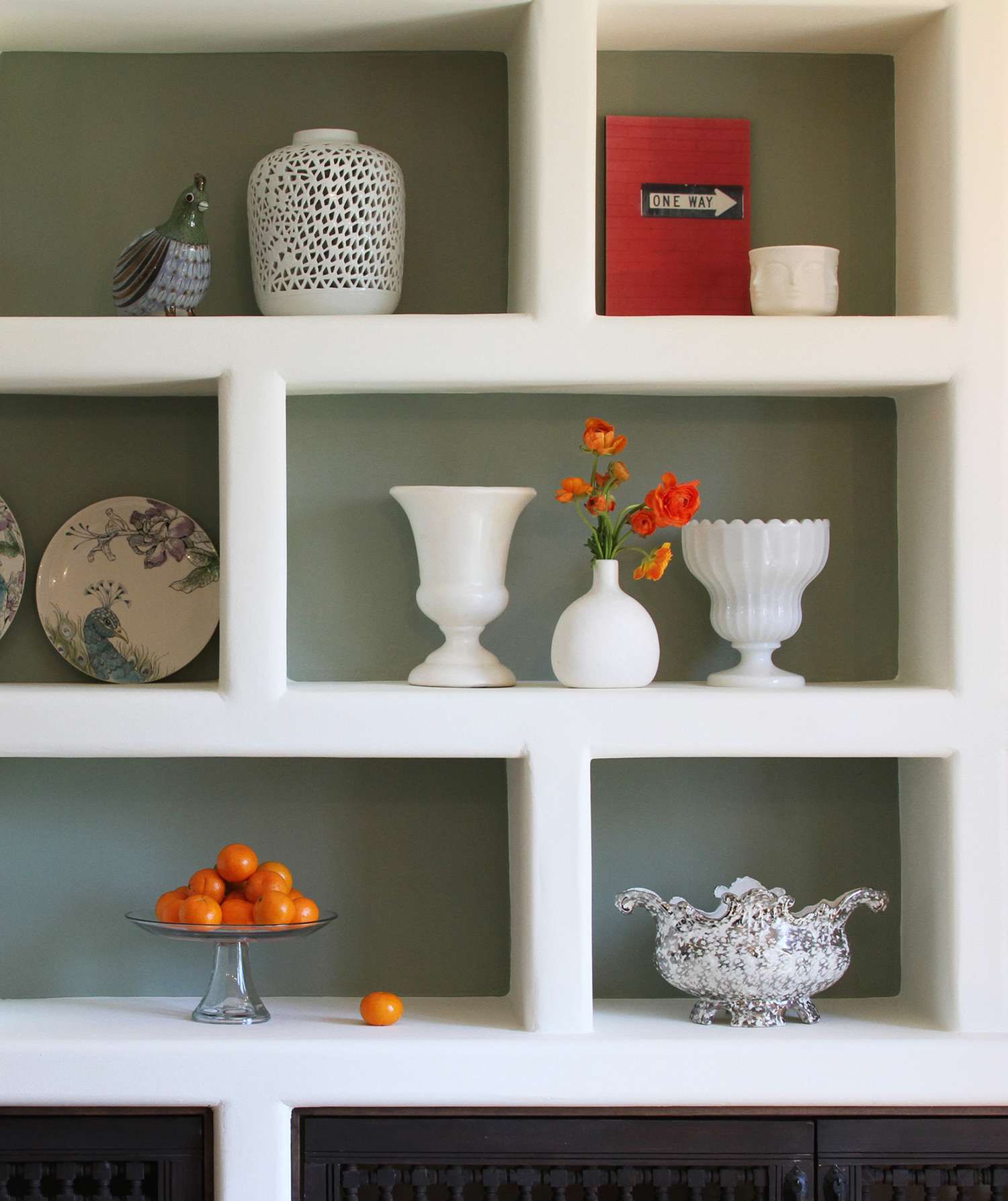 Shelves with pops of orange