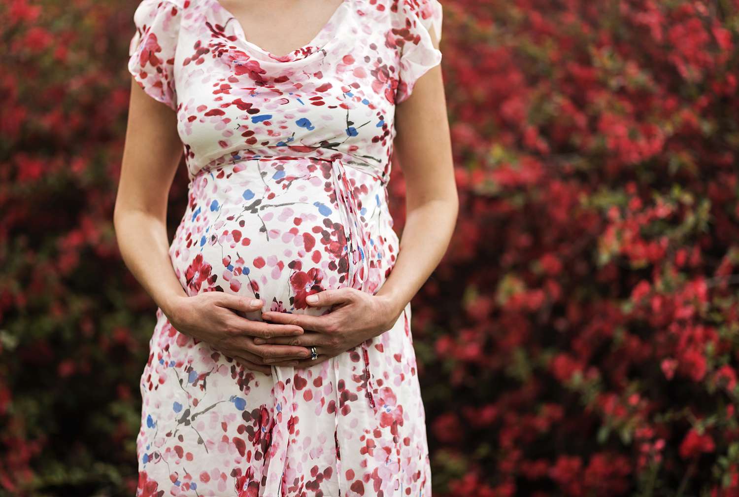Pregnant woman in floral dress