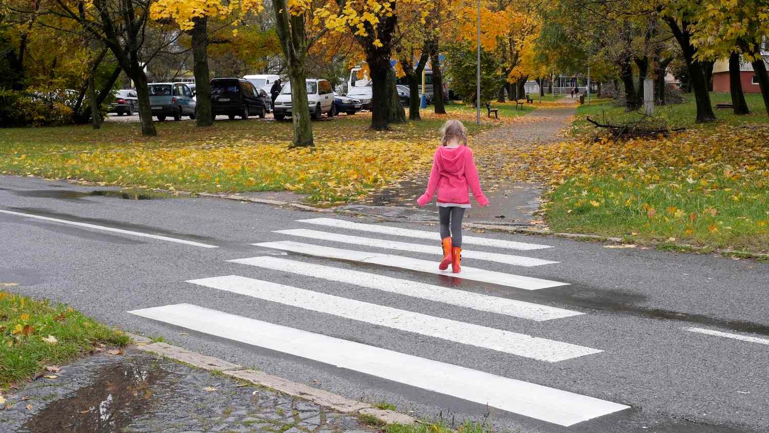 Girl crossing street alone