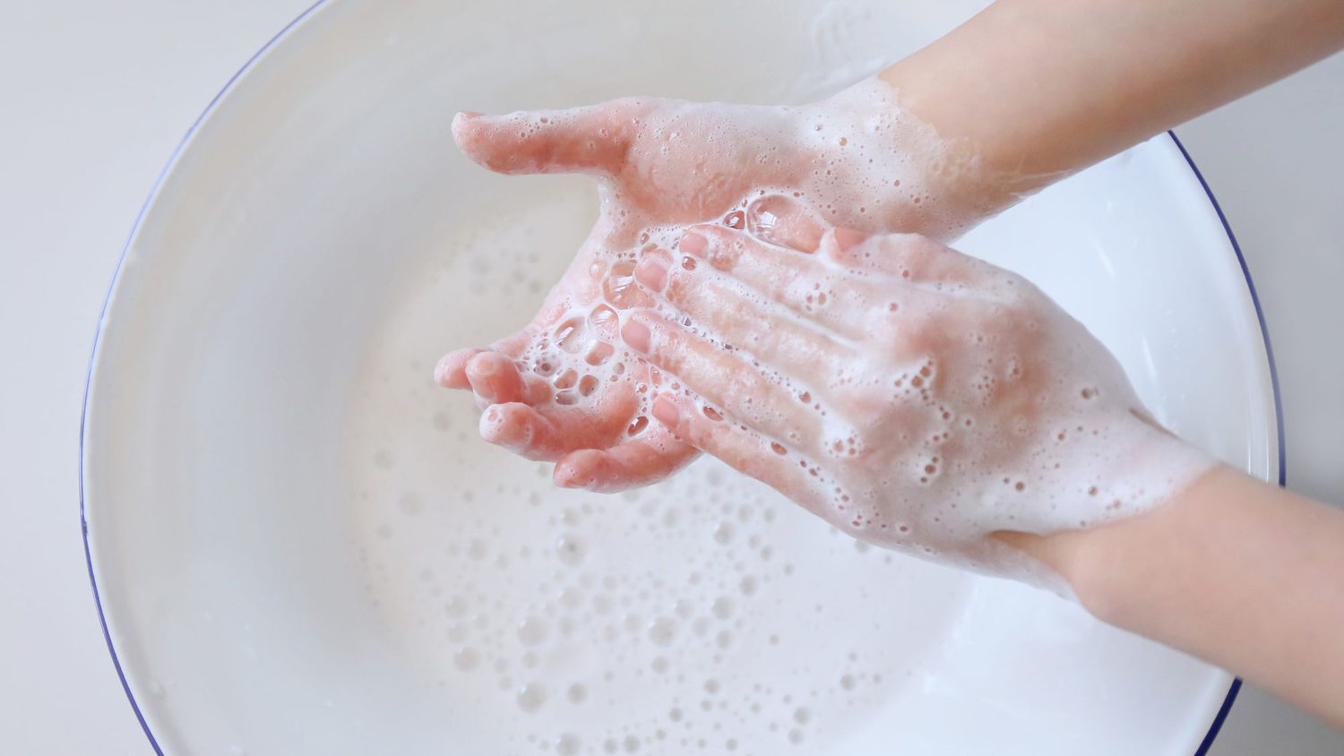 washing hands with moisturizing hand soap for eczema