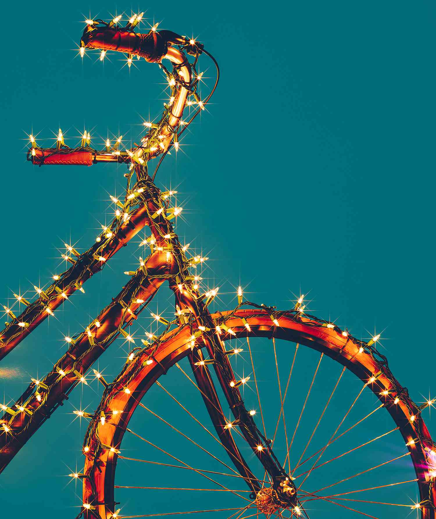 Bicycle wrapped in lights