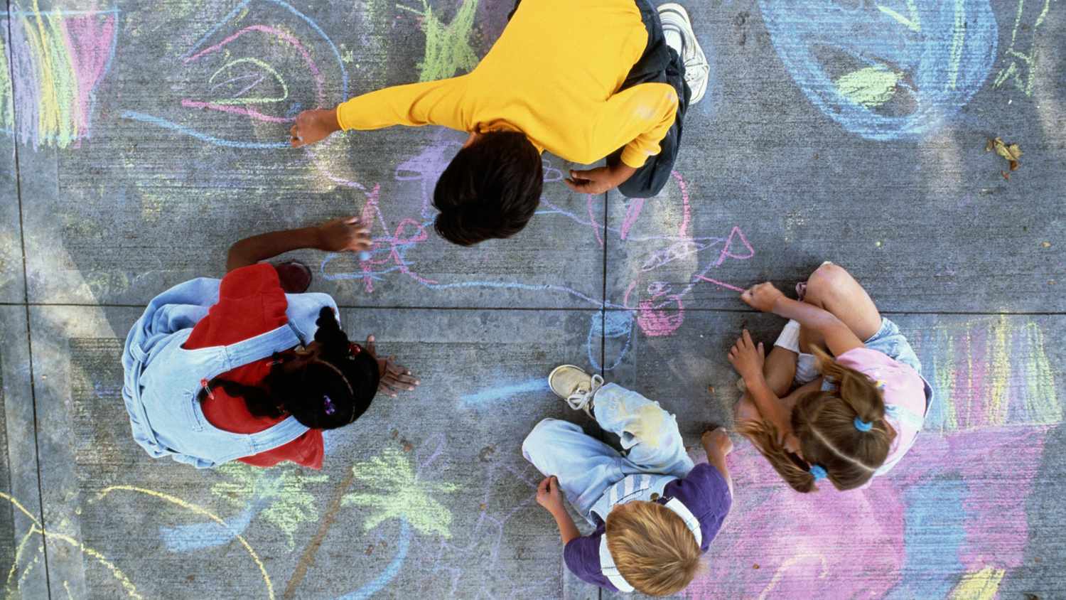 How to talk to kids about race and racism - kids playing with chalk