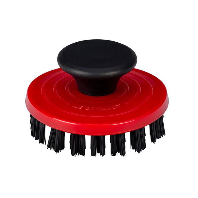 Red and black grill pan scrubber brush